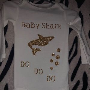 6-9 months vinyl onsie